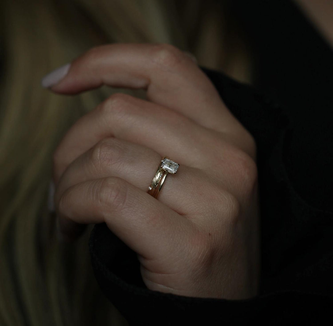 Lifestyle shot of radiant solitaire diamond ring on hand