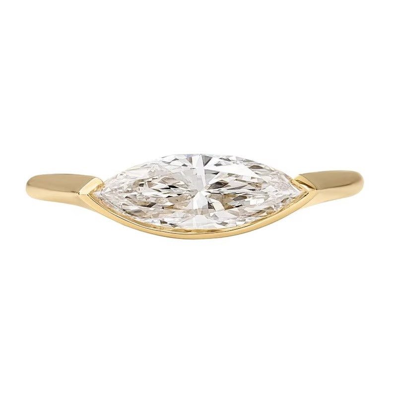 Profile view of marquise cut solitaire engagement ring band