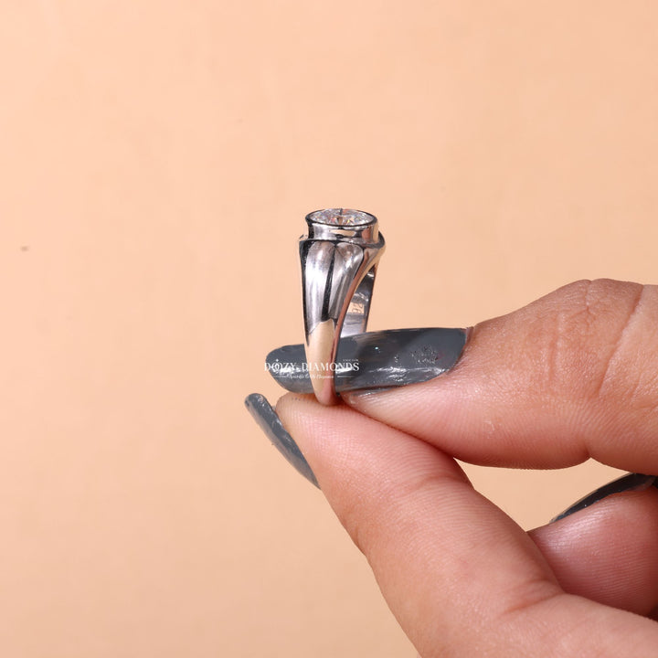 Top-down view of round cut dome engagement ring