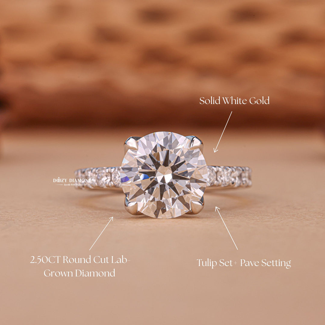 Round solitaire engagement ring offered in gold and platinum