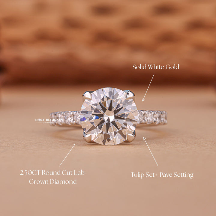 Round solitaire engagement ring offered in gold and platinum