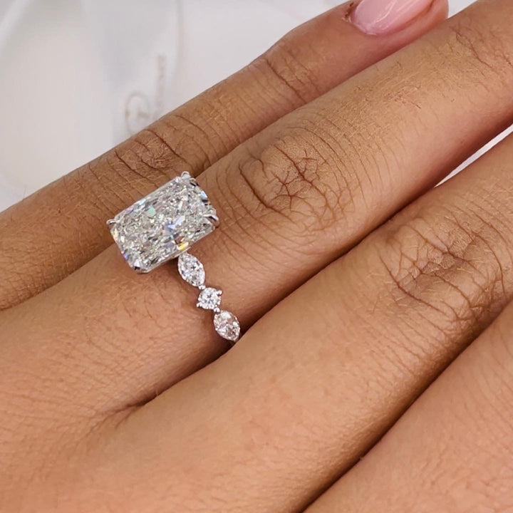 Radiant solitaire diamond ring presented in signature gift packaging