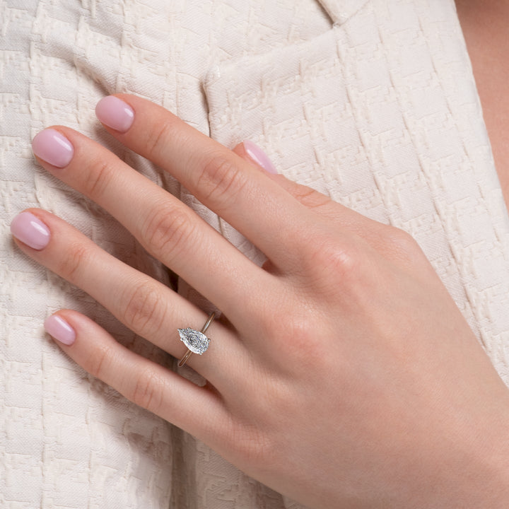 Pear solitaire lab grown diamond ring side profile in gold setting