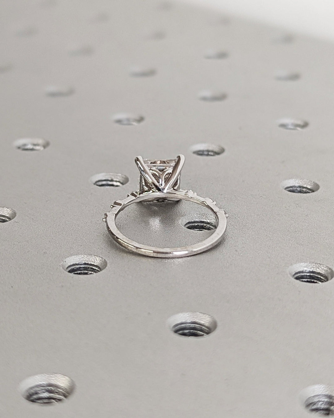 Princess cut pave engagement ring shown in real-life wear