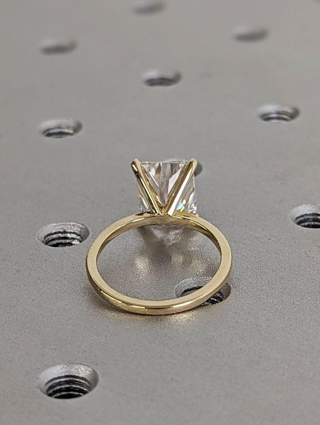 Radiant cut diamond ring worn on hand