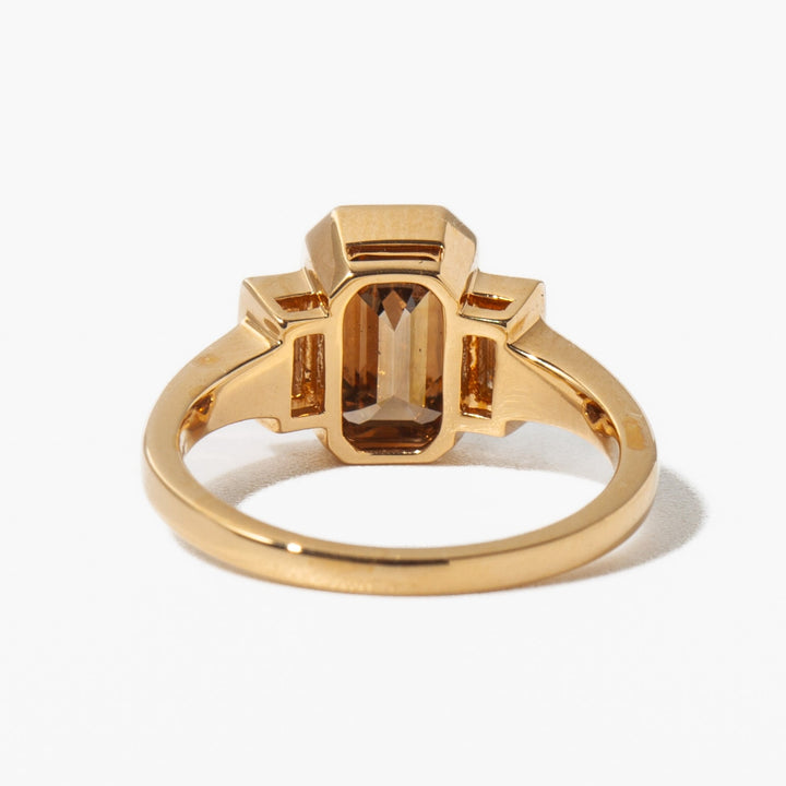 Emerald three stone lab grown diamond ring side profile in gold setting