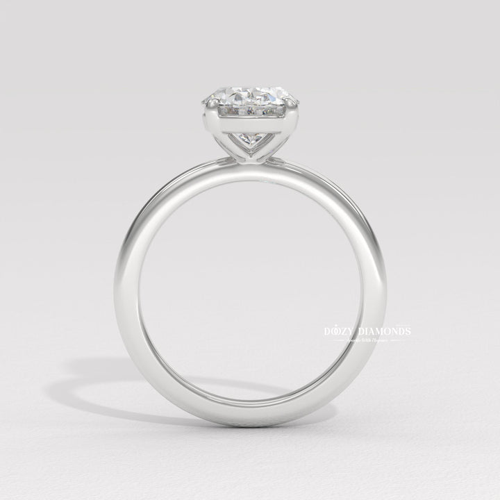 IGI certified oval cut diamond in solitaire engagement ring setting