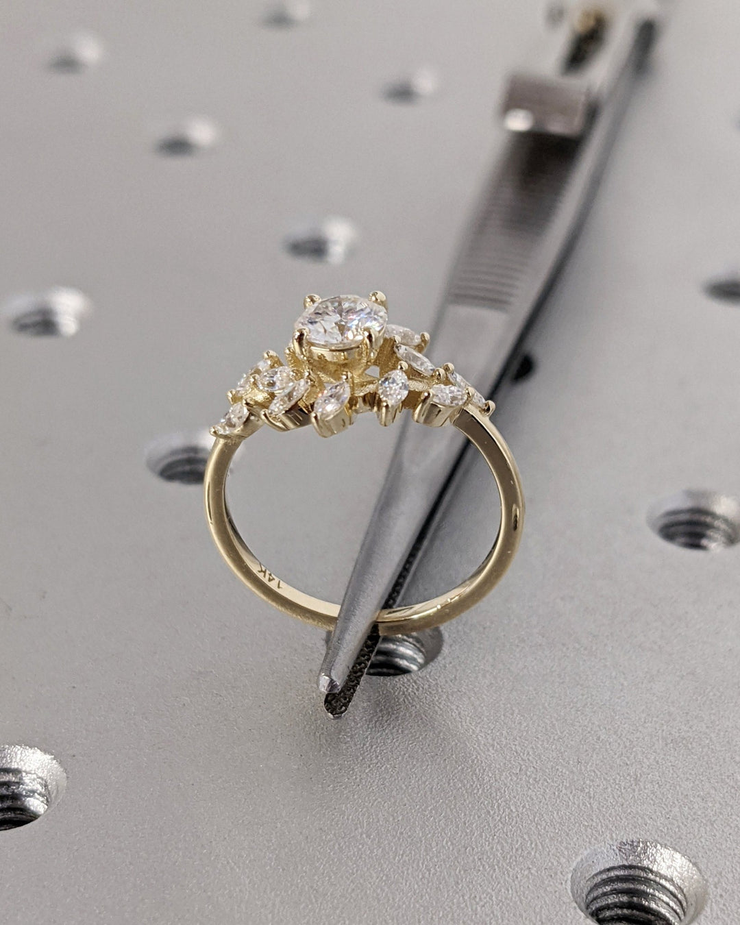 Lifestyle shot of round cluster diamond ring on hand