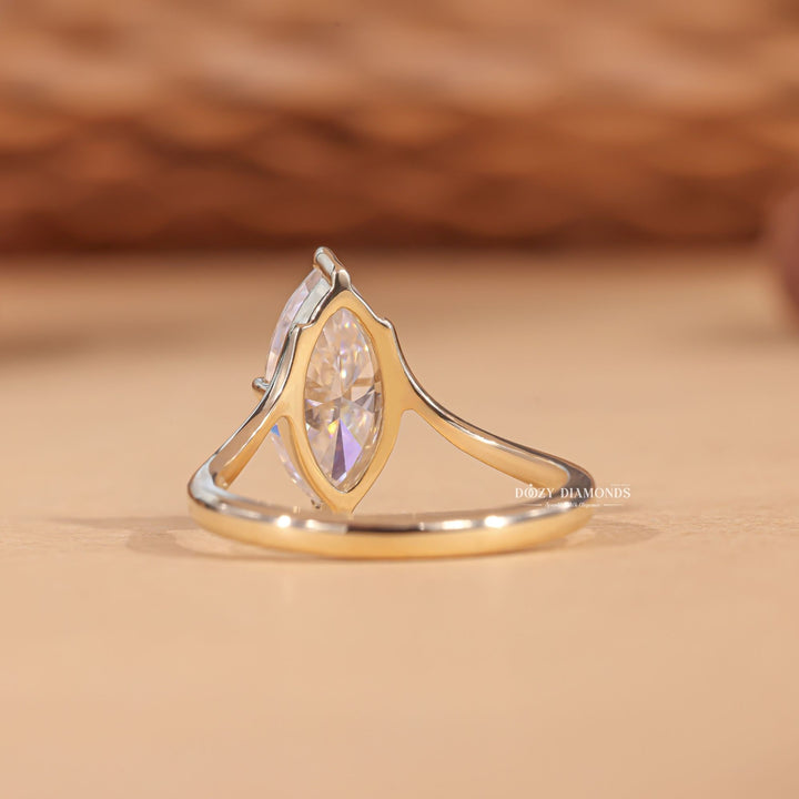 Premium marquise cut solitaire engagement ring crafted in solid gold