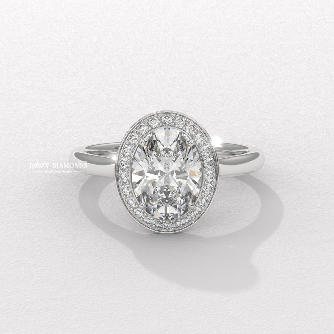 Oval cut solitaire engagement ring with IGI certified center diamond