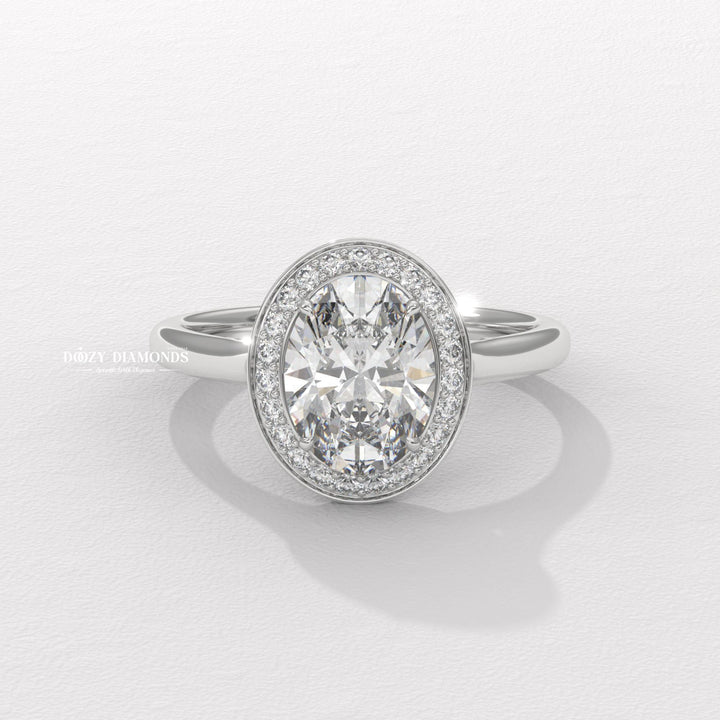 Oval cut solitaire engagement ring with IGI certified center diamond
