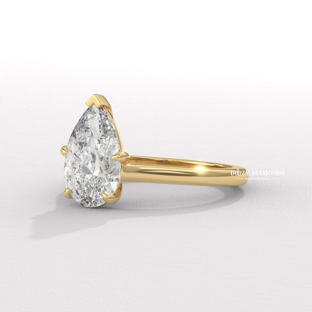 Top-down view of pear cut solitaire engagement ring