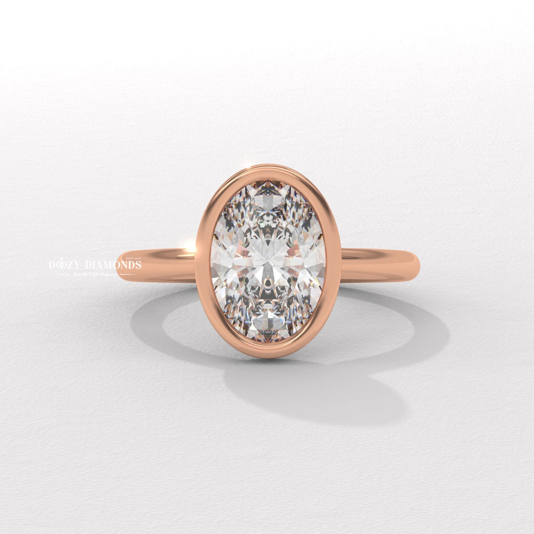Oval bezel engagement ring photographed in natural light