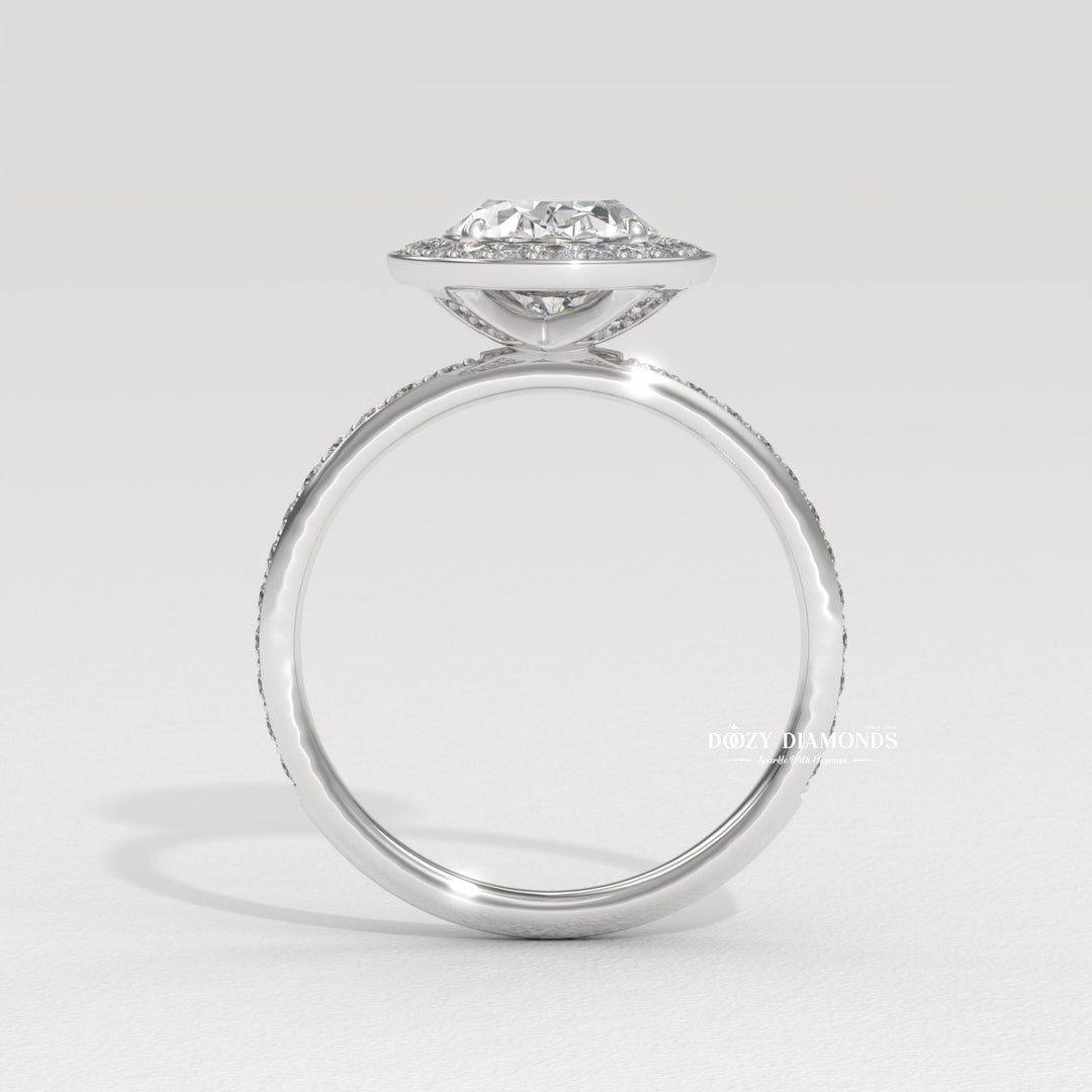 Certified oval cut diamond featured in halo engagement ring