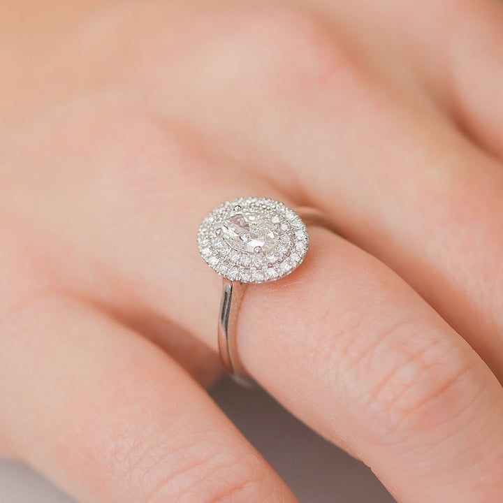 Oval cut engagement ring side view showing band detail