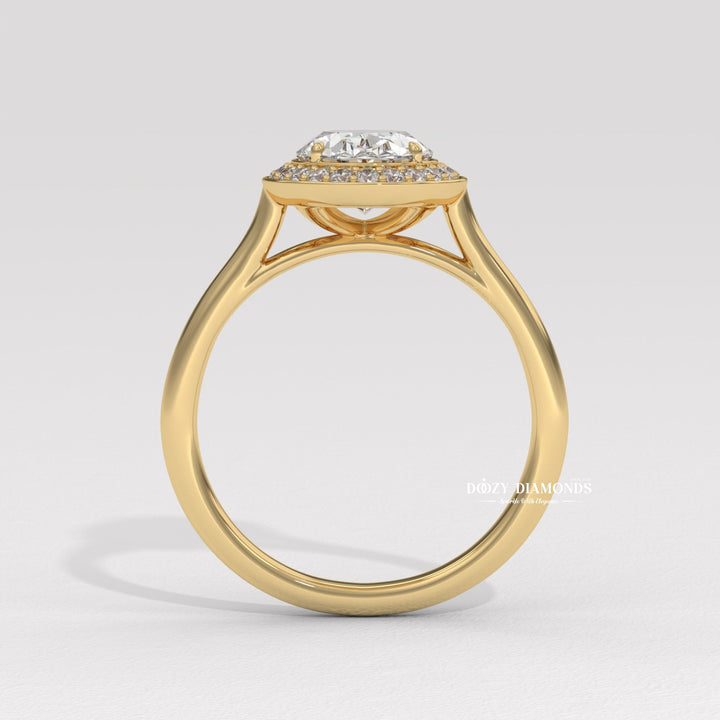 Oval cut solitaire engagement ring shown in real-life wear