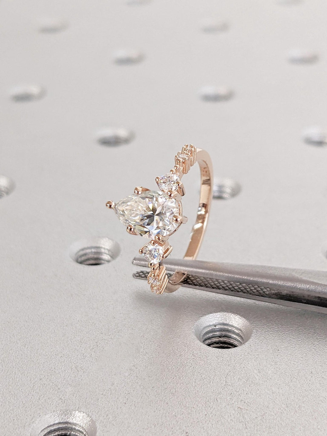 Classic pear cluster engagement ring crafted for everyday wear