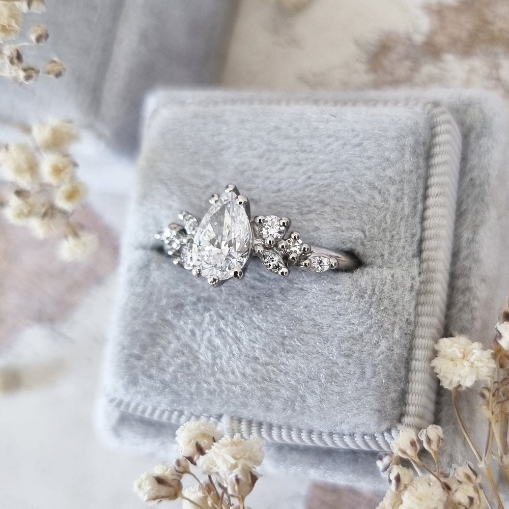 Classic pear cluster engagement ring crafted for everyday wear