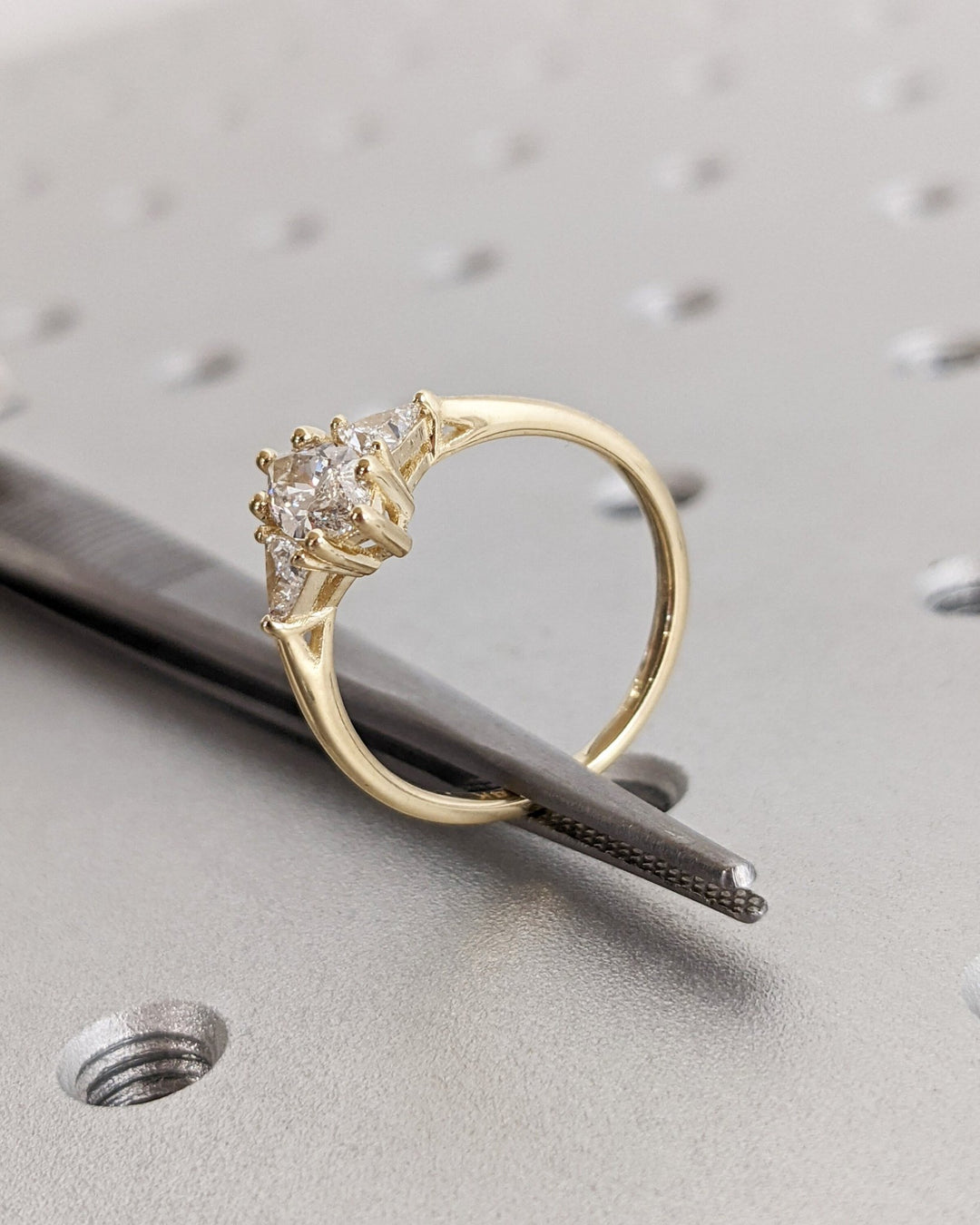 Marquise cut engagement ring side view showing band detail