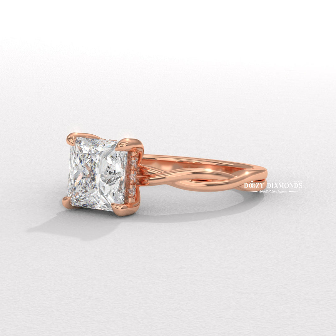 Lifestyle shot of princess solitaire diamond ring on hand
