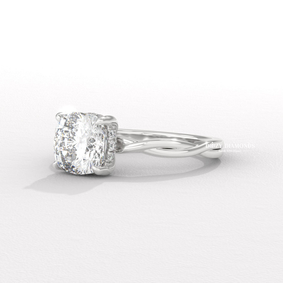 Cushion cut diamond ring worn on hand