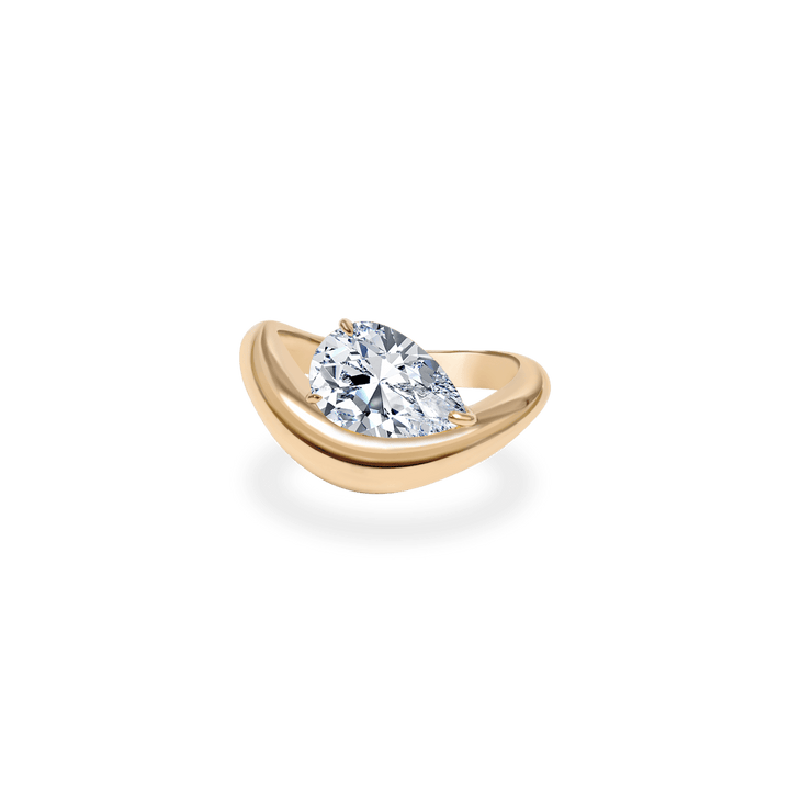 Pear dome engagement ring offered in gold and platinum