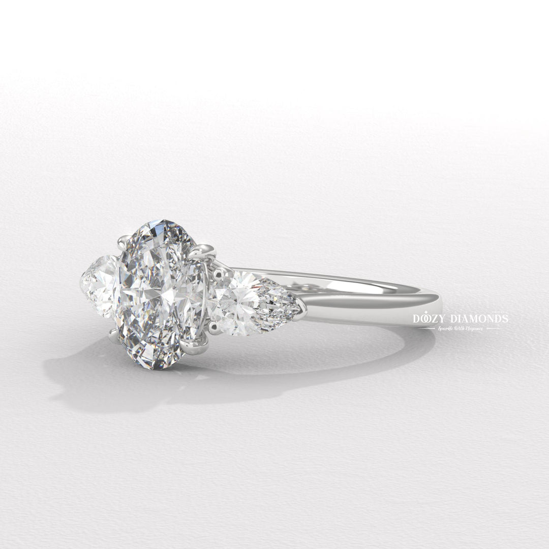 Profile view of oval cut three stone engagement ring band