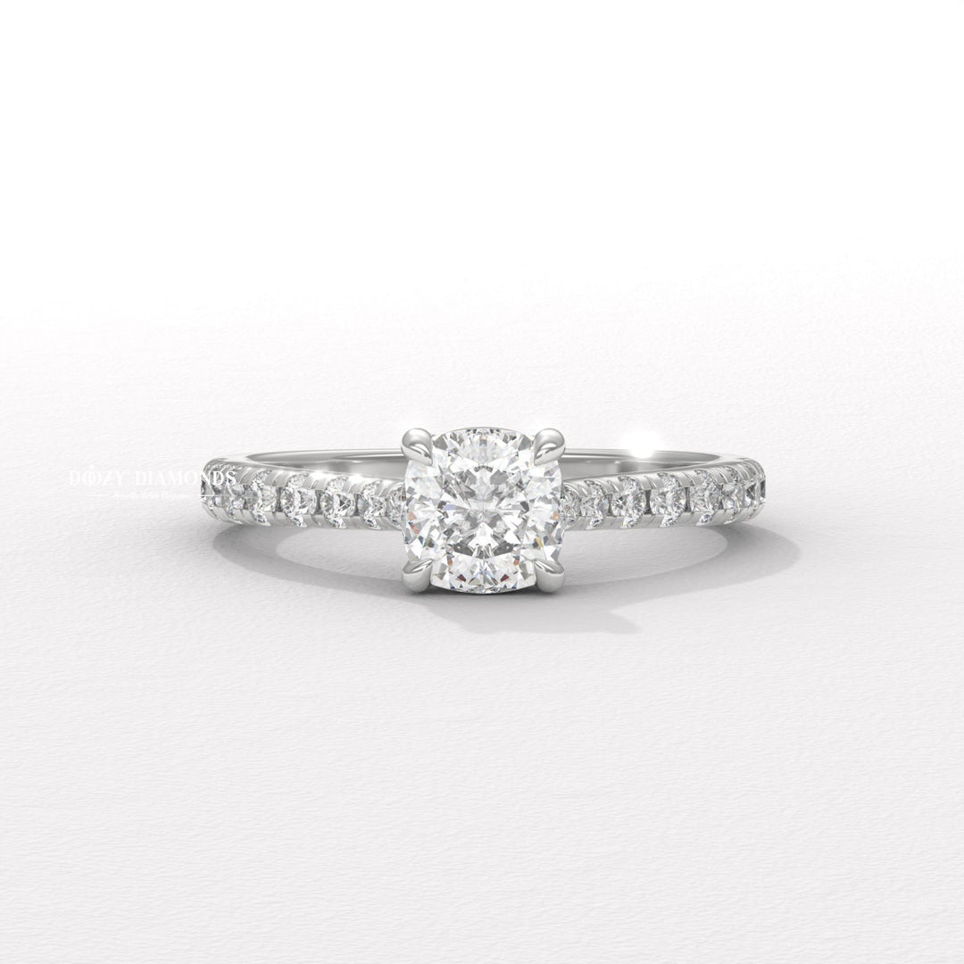 Cushion solitaire engagement ring viewed from the side