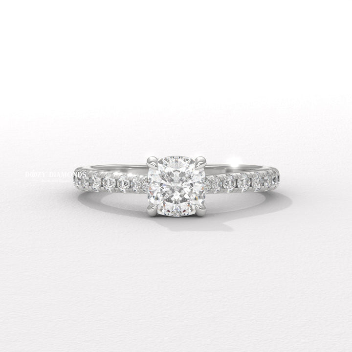 Cushion solitaire engagement ring viewed from the side