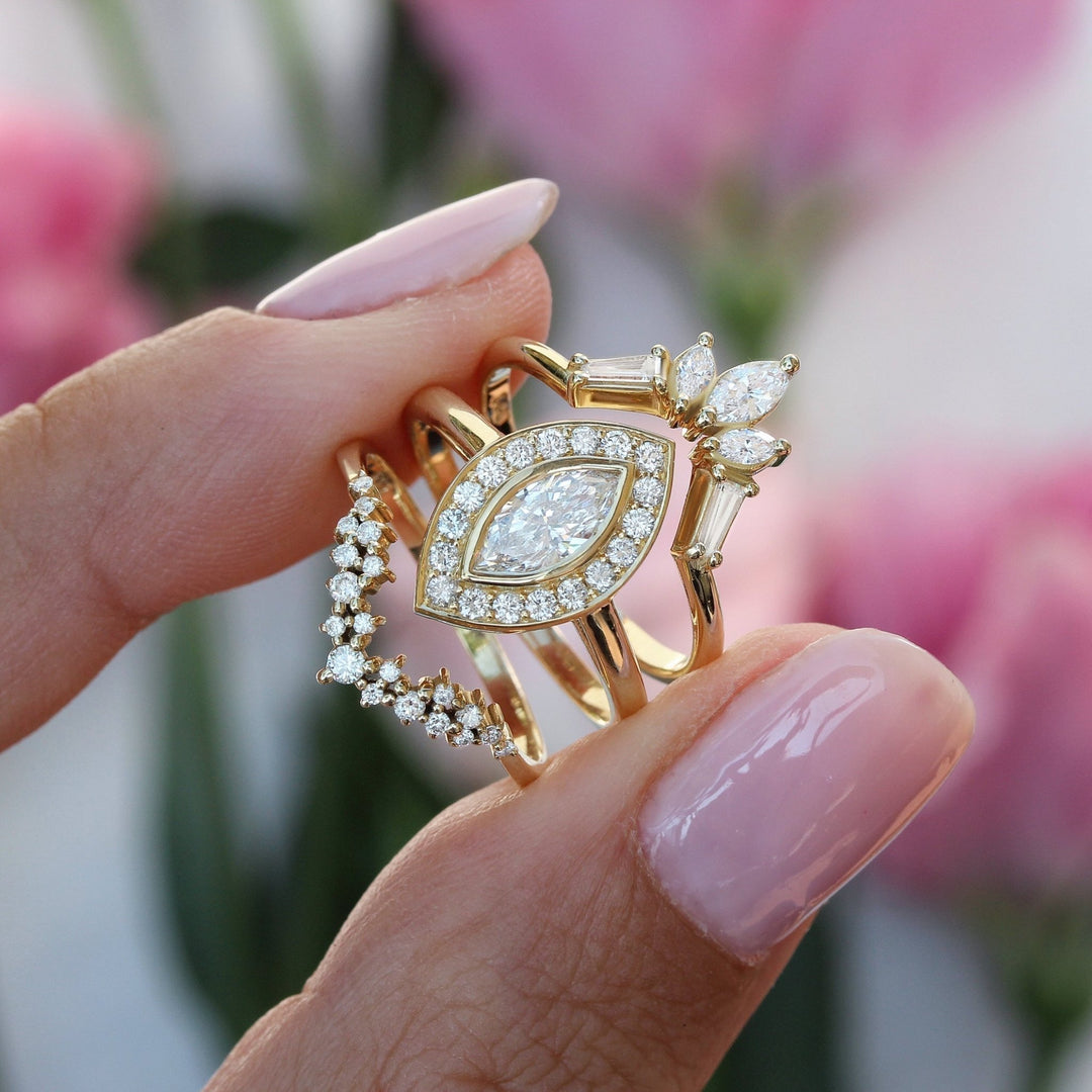 Marquise halo diamond engagement ring available in multiple metals