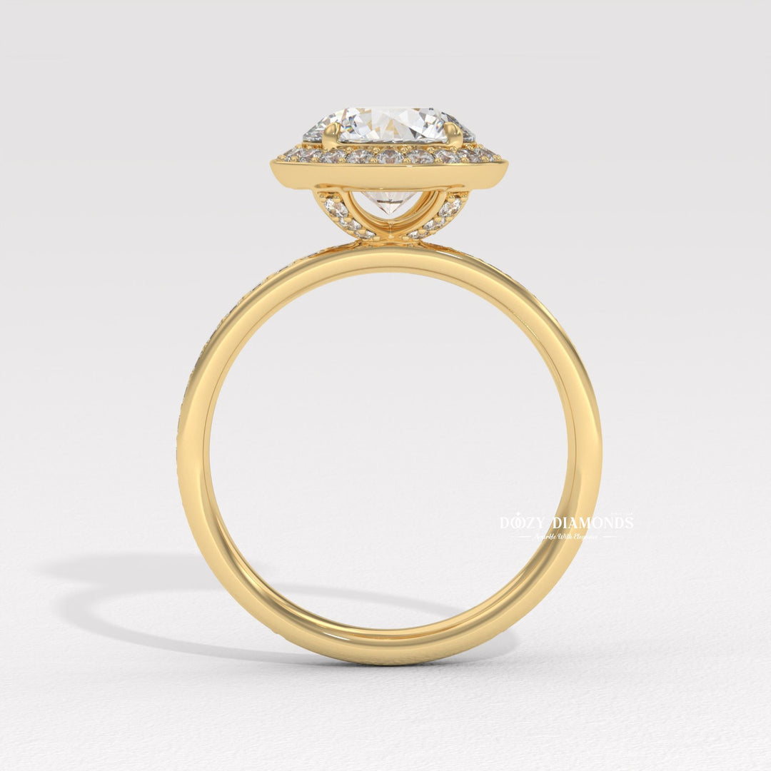 Round halo diamond ring displayed on jewelry stand