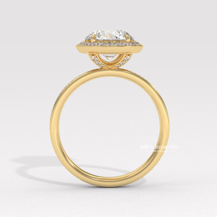 Round halo diamond ring displayed on jewelry stand