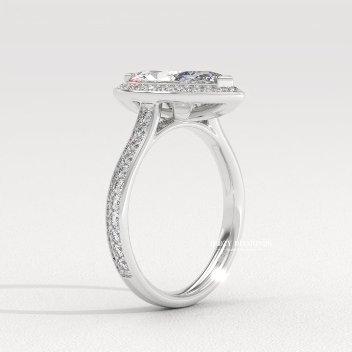 Marquise halo engagement ring photographed in natural light