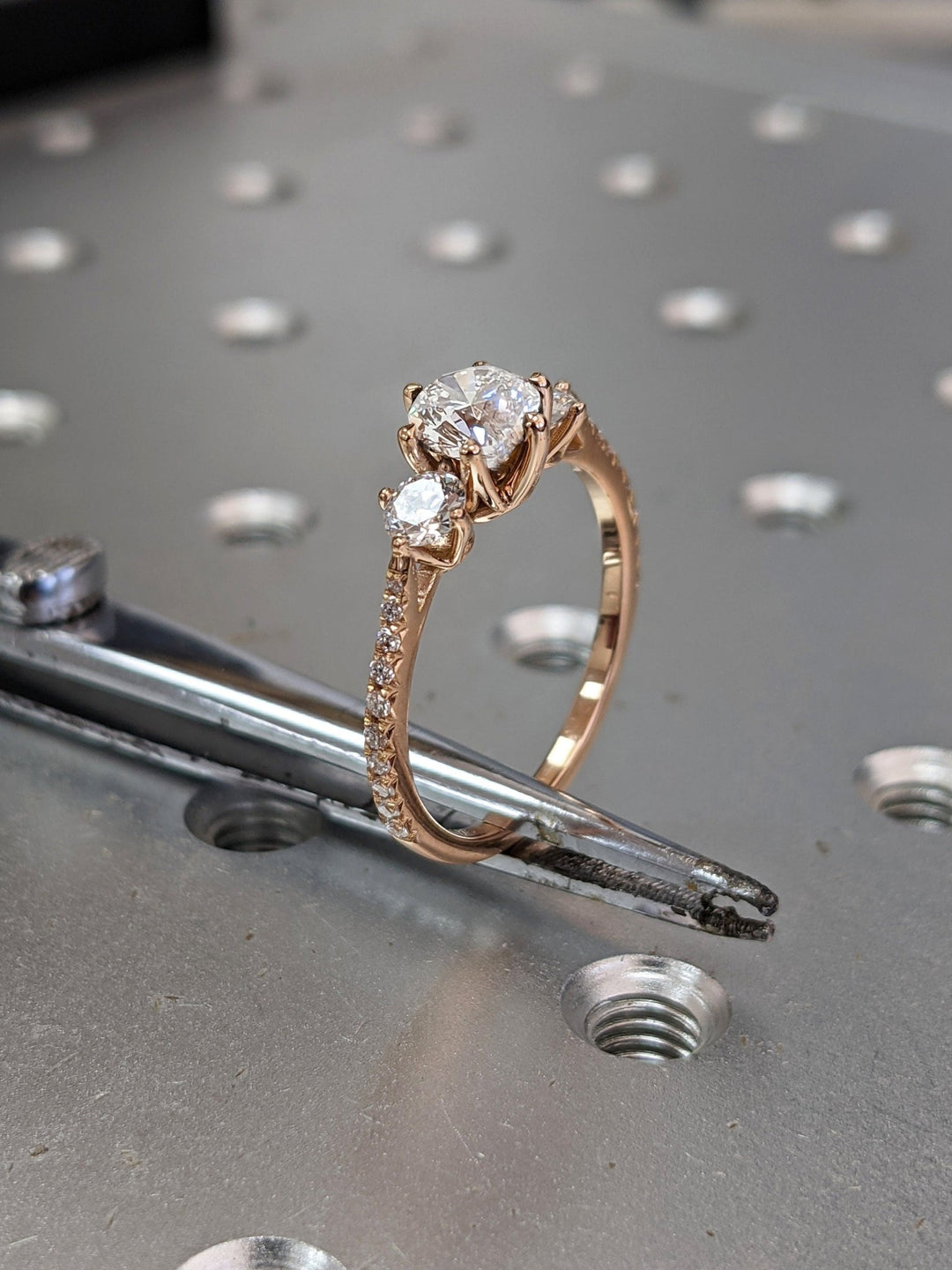 Round solitaire lab grown diamond ring fitted on finger