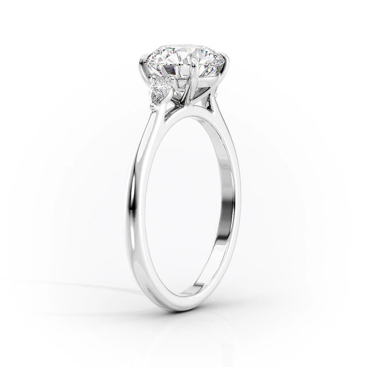Lifestyle shot of oval three stone diamond ring on hand