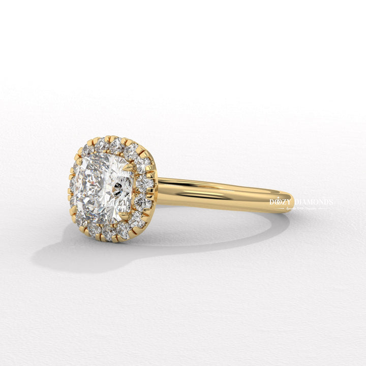 Cushion cut diamond ring worn on hand