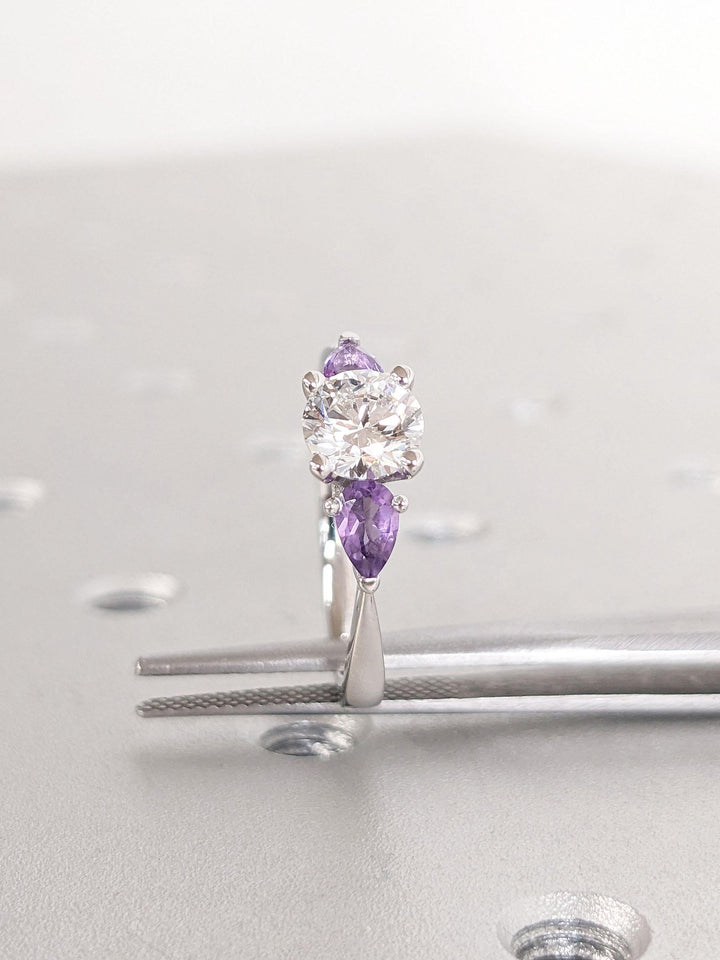 Fine craftsmanship detail on round solitaire engagement ring