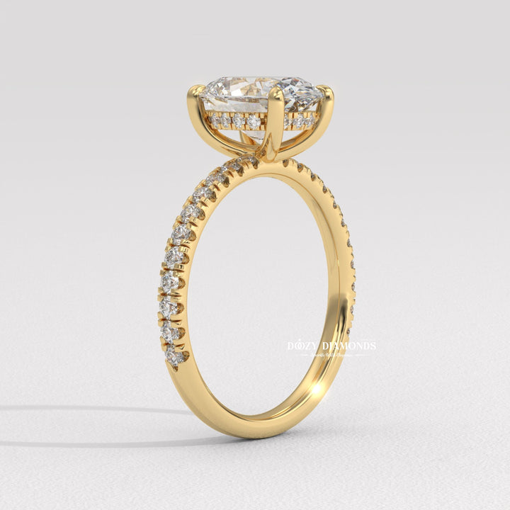 Oval hidden halo diamond engagement ring available in multiple metals