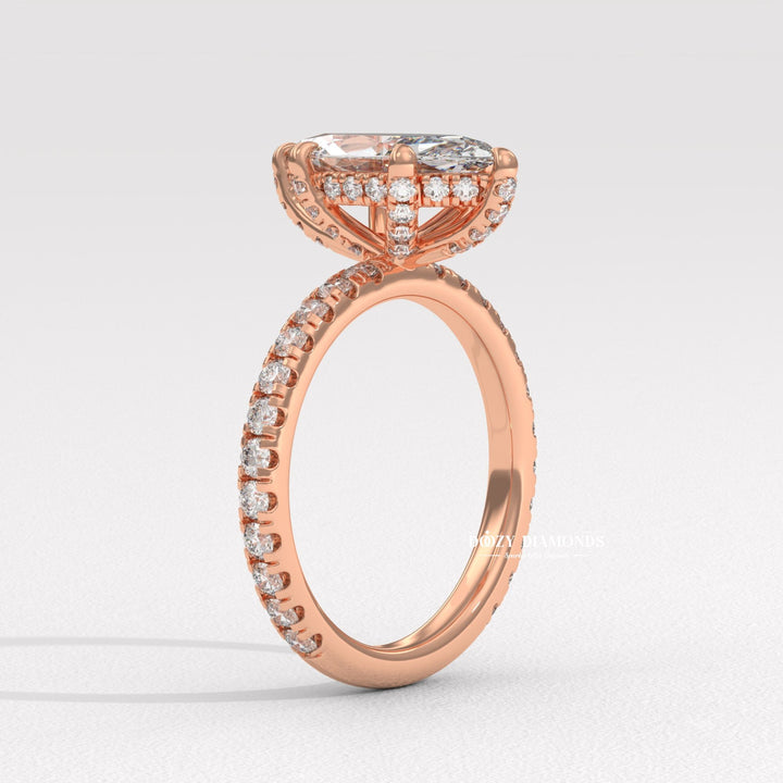 Close-up of marquise cut center diamond in solitaire engagement ring