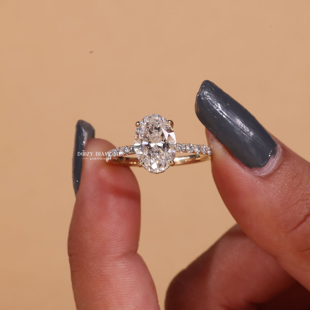 IGI certified oval cut diamond in hidden halo engagement ring setting