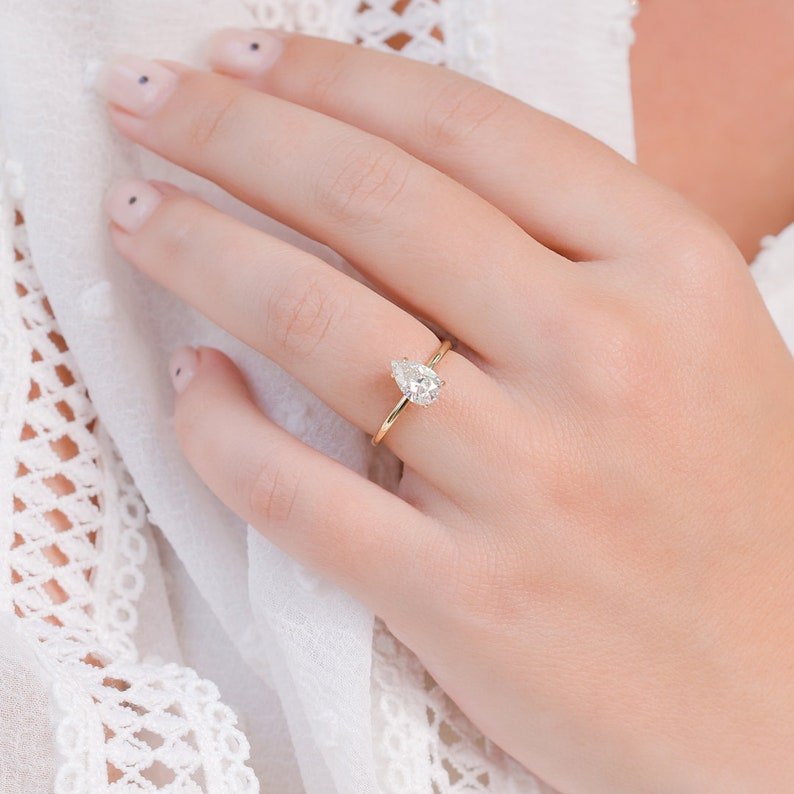 Shop pear cut hidden halo lab grown diamond engagement ring online