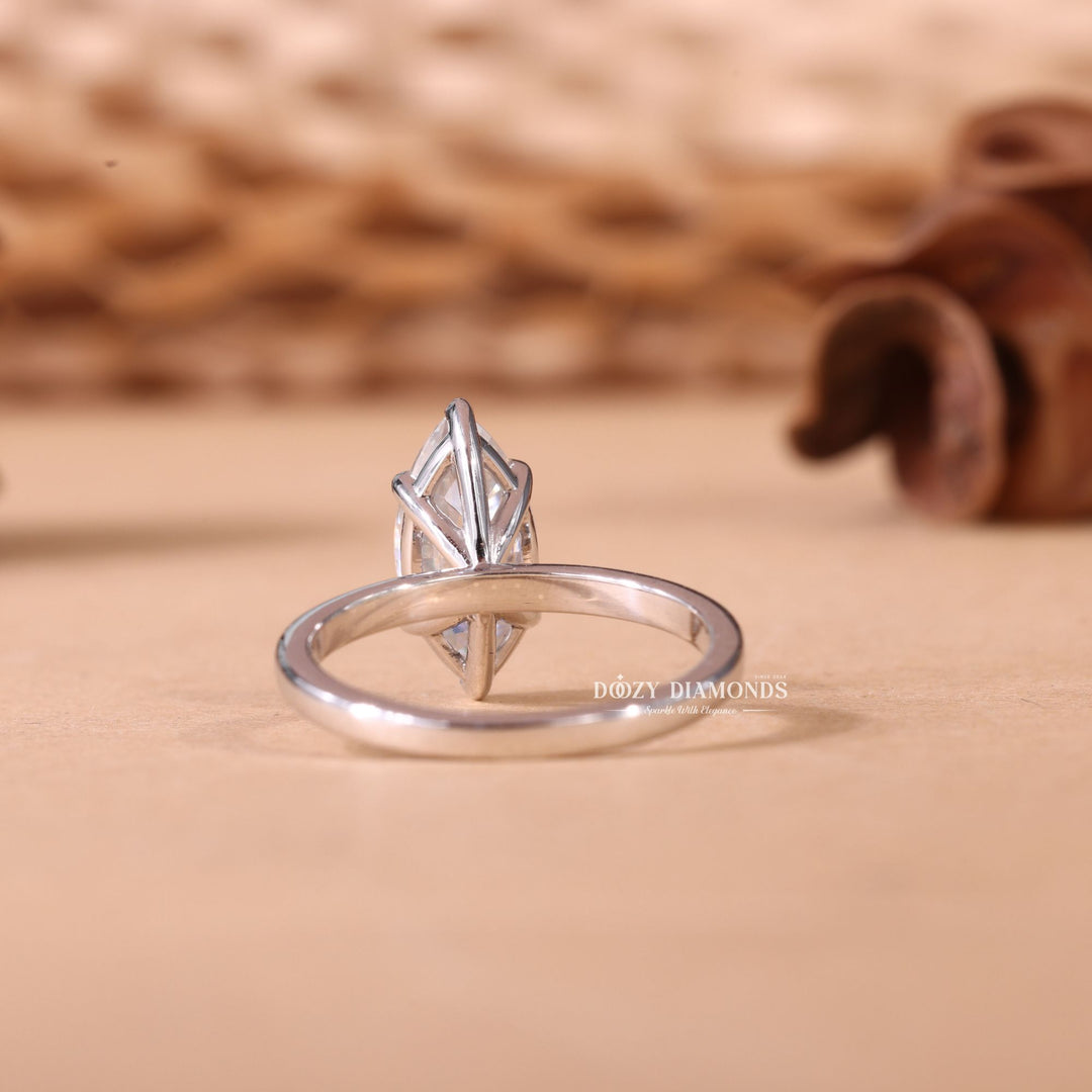 IGI certified marquise cut diamond in solitaire engagement ring setting