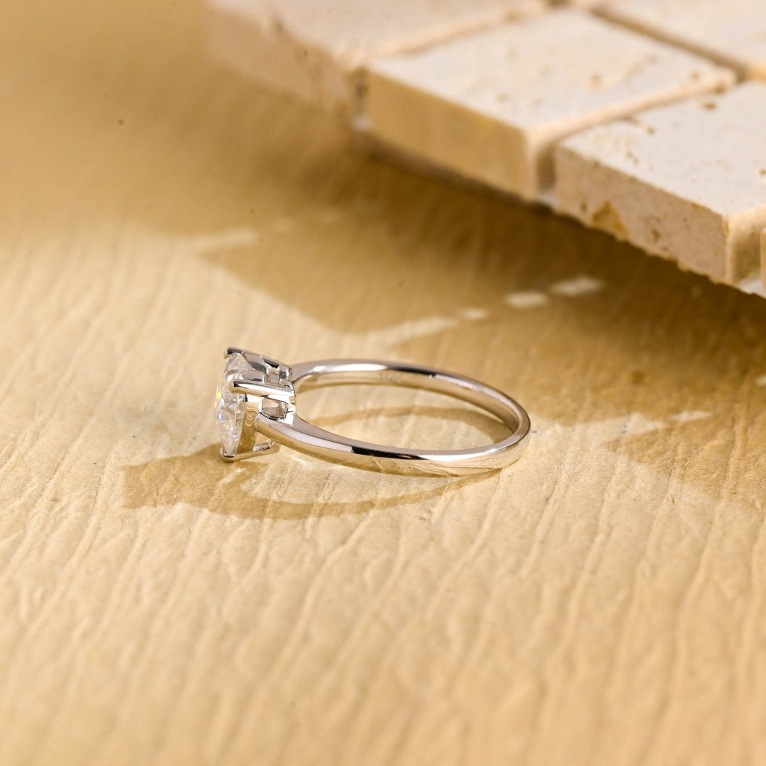Heart solitaire diamond engagement ring available in multiple metals