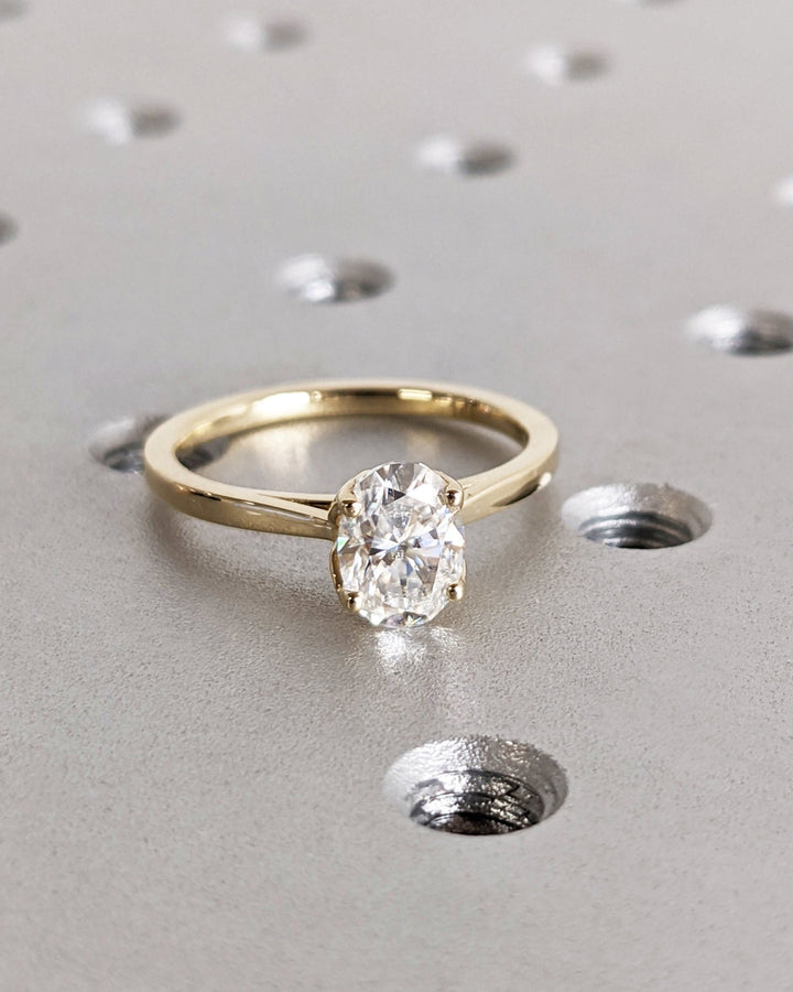 Oval solitaire engagement ring close-up showing high clarity diamond clarity