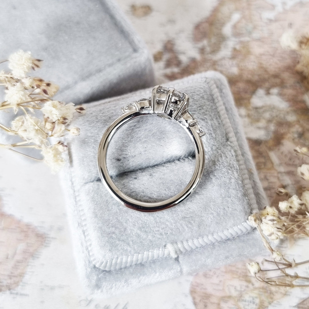 Round cut engagement ring shown with authenticity certificate