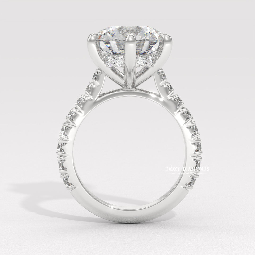 Fine craftsmanship detail on round hidden halo engagement ring