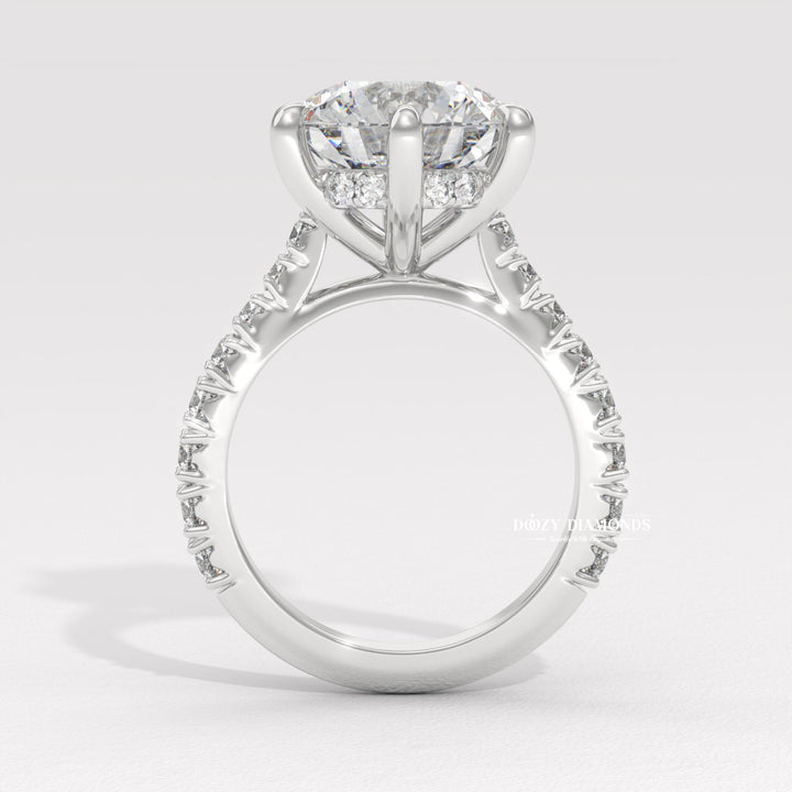 Fine craftsmanship detail on round hidden halo engagement ring