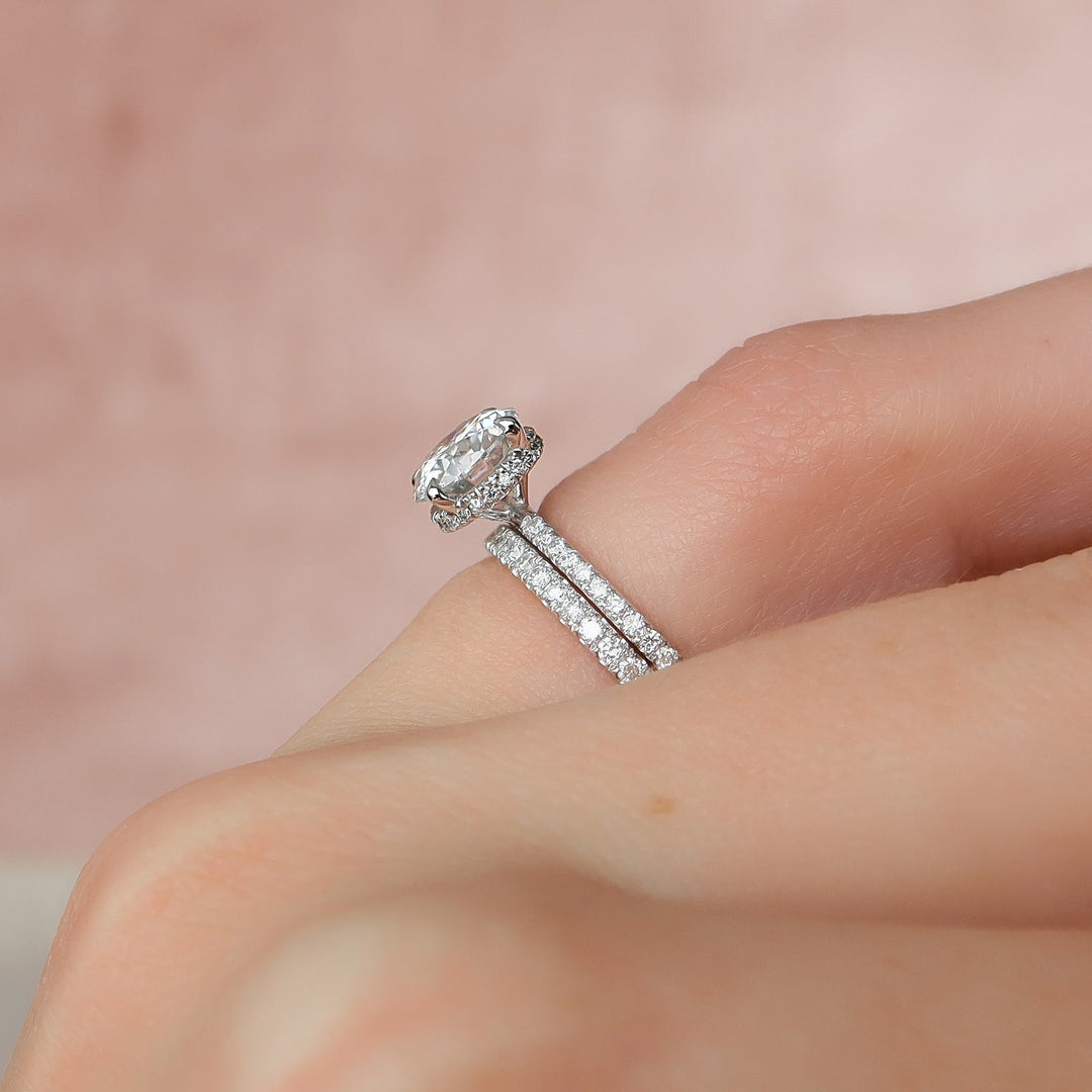 Close-up of round cut center diamond in hidden halo engagement ring