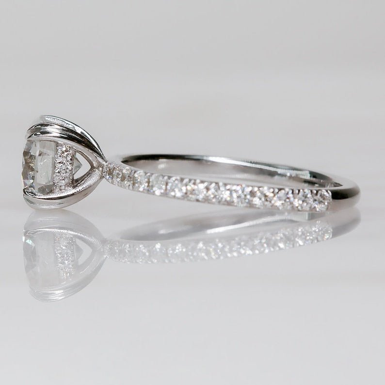 Top-down view of round cut hidden halo engagement ring