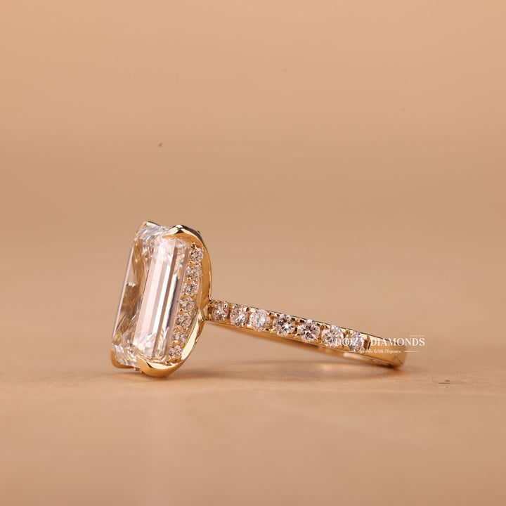 Premium emerald cut hidden halo engagement ring crafted in solid gold